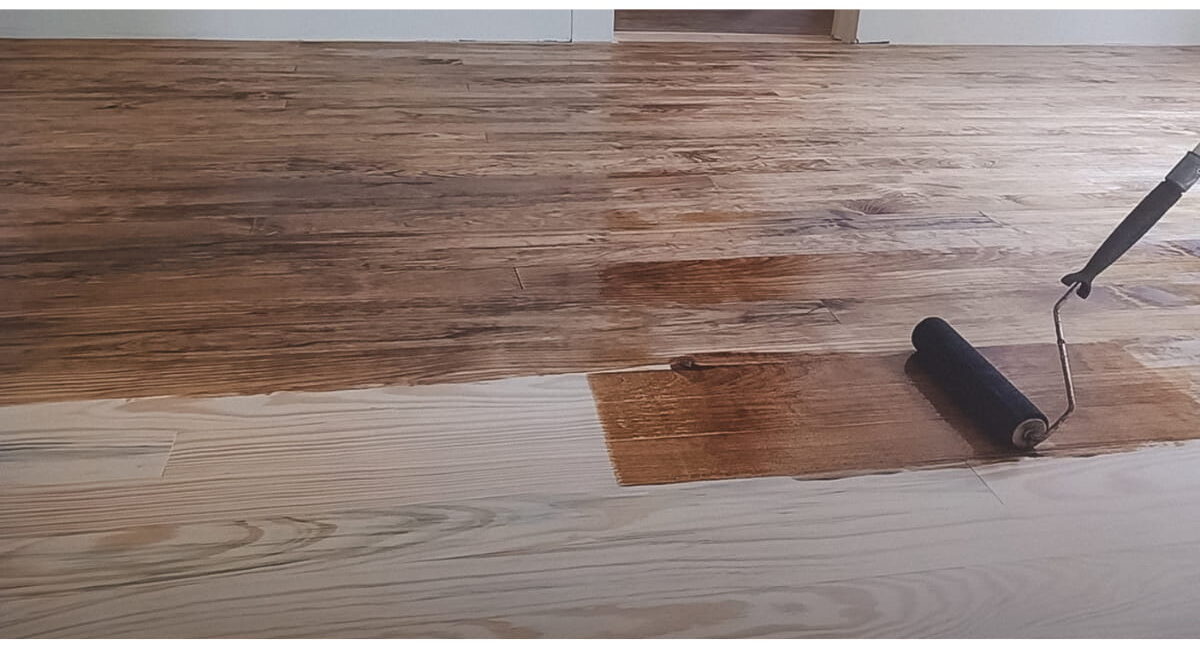 Dark tung oil application on new pine floors in an old house.